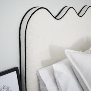 curved bedhead with contrast piping